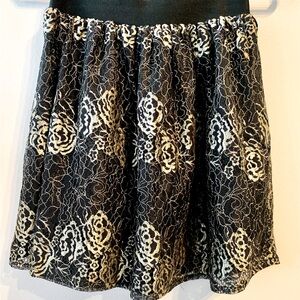 Wild Blue skirt, lace, black and gold, lined. Elastic waste. Size small -medium